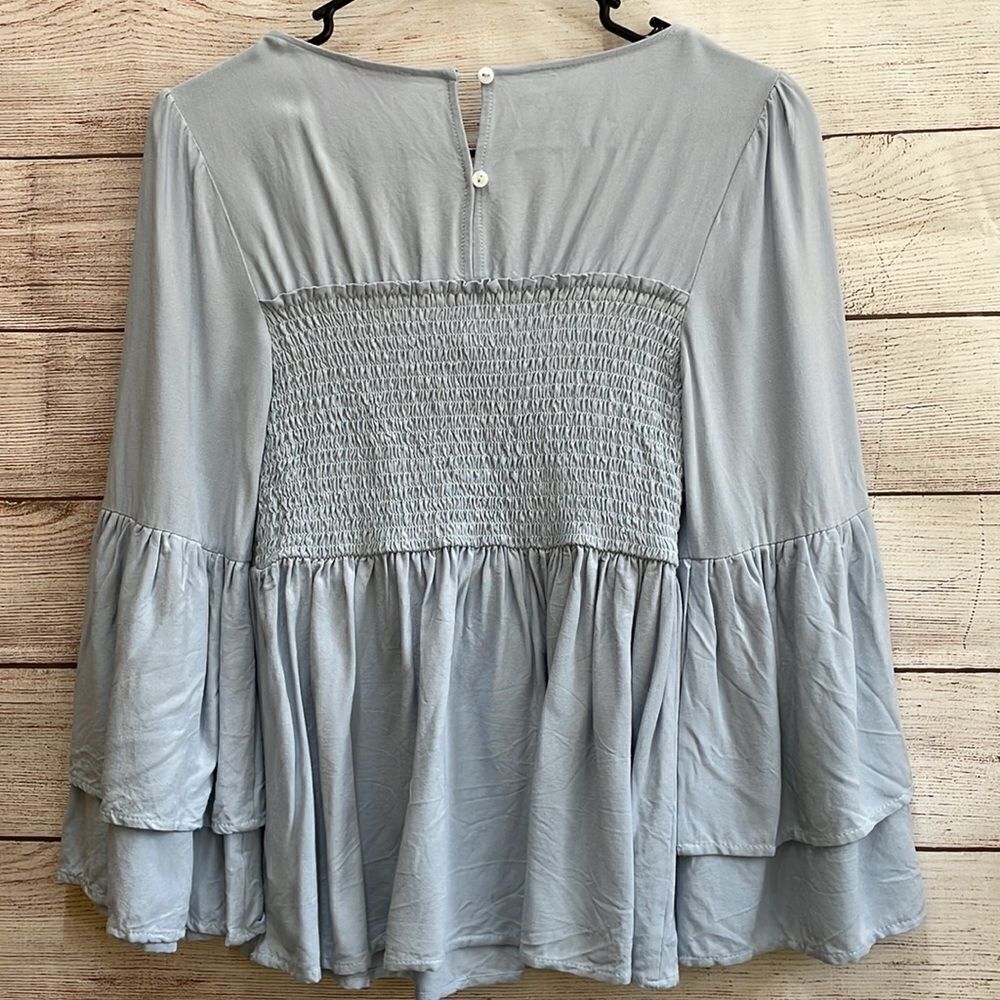 PINK LILY SMOCKED TOP WITH‎ BELL ALEEVES IN BLUE - Picture 7 of 7
